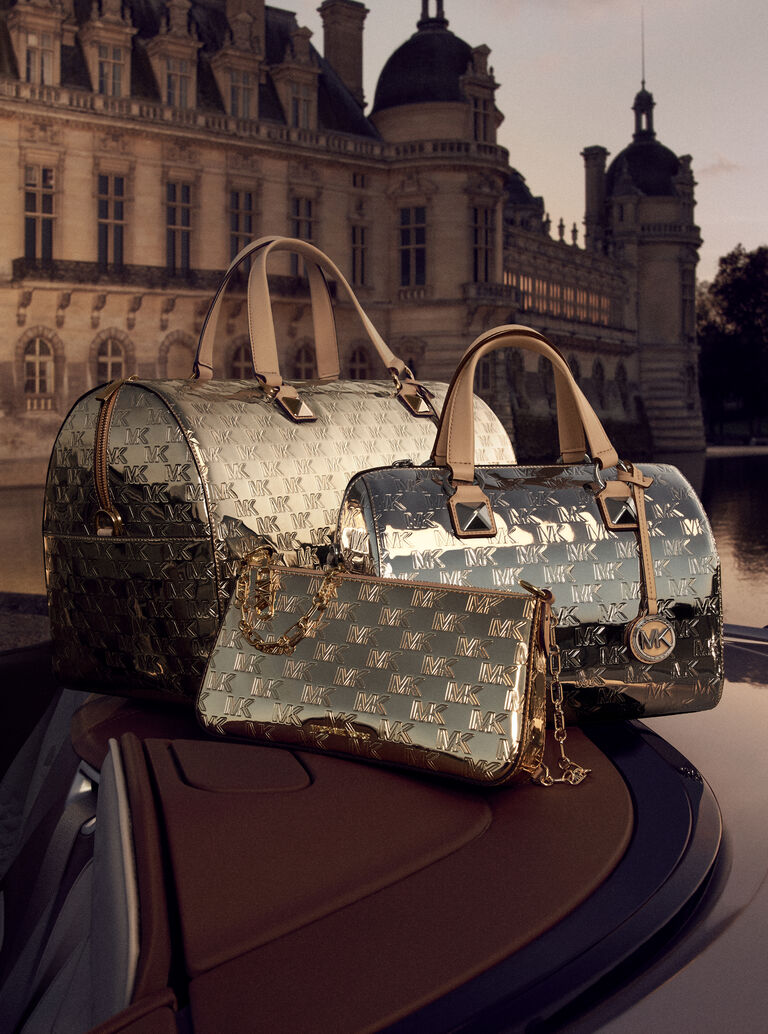 Why are Michael Kors bags less expensive than Louis Vuitton? - Quora